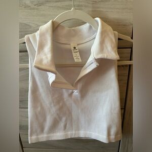 White crop top from 90 degree. runs small